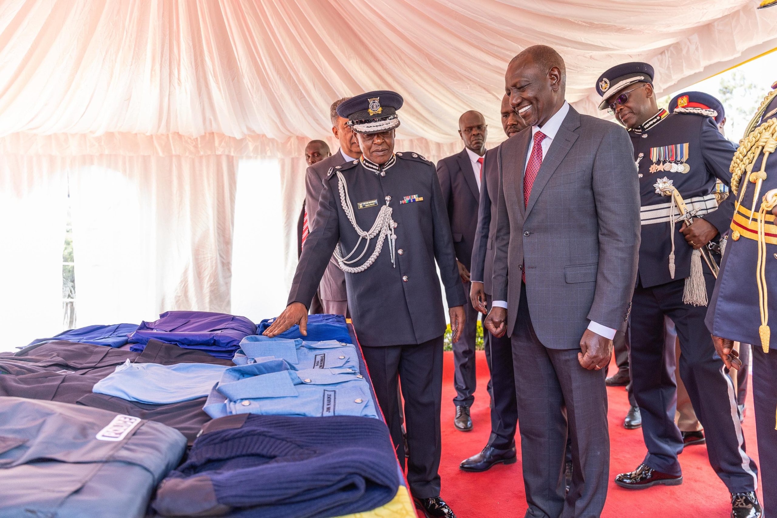 President William Ruto inspecting the new police uniform. PHOTO/@WilliamsRuto/X