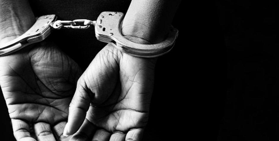 A person in handcuff. PHOTO/@DCI_Kenya/X