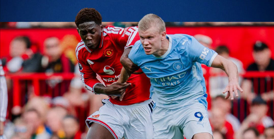 Manchester United's Kobbie Mainoo (Left) and Manchester City's Erling Haaland in the 2026/27 Manchester derby on Sunday, September 13, 2026. PHOTO/https://www.facebook.com/mancity/photos