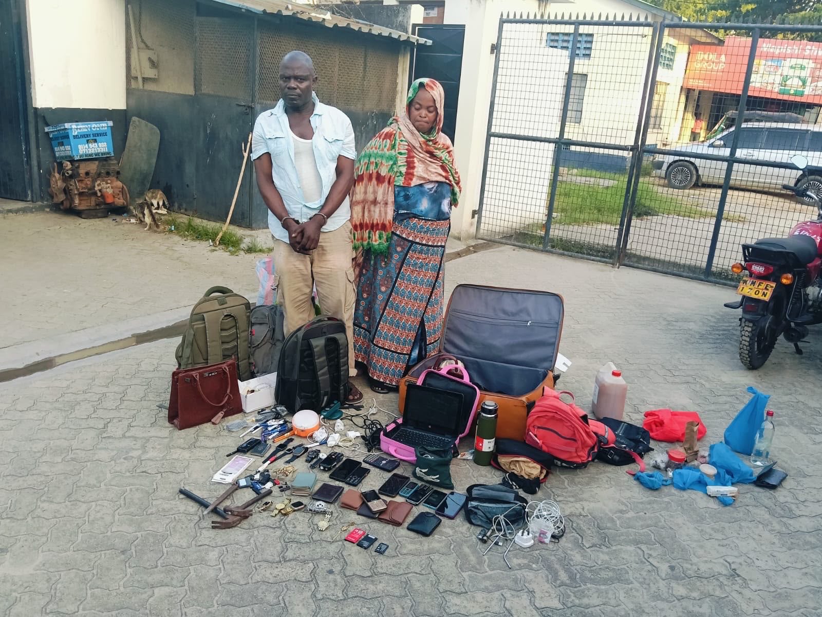 Tanzania couples arrested by the DCI and recovered valuables allegedly stolen from a passenger who was drugged and rendered unconscious during a Dreamline bus journey from Nairobi to Mombasa..PHOTO/@DCI_Kenya/X