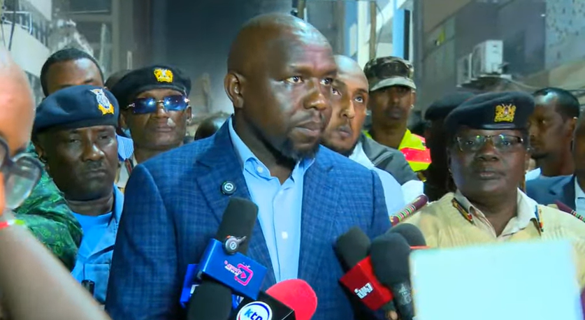 Interior Cabinet Secretary Kipchumba Murkomen addressing the press at the scen of the collpased Easleigh buiding on Friday, October 23, 2026.PHOTO/https://web.facebook.com/OnesimusKipchumbaMurkomen