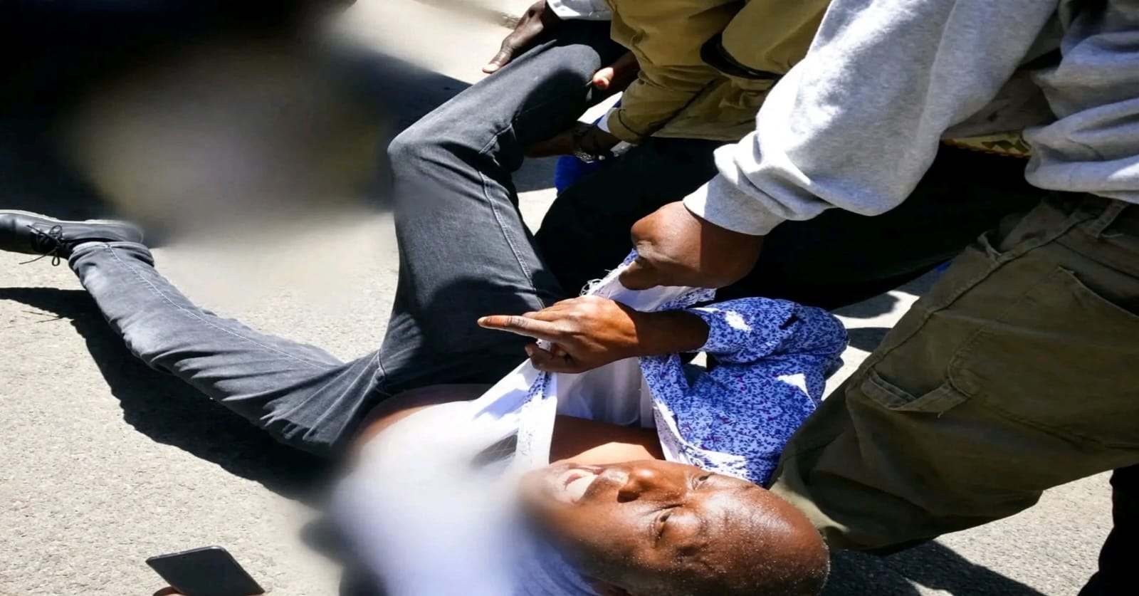 Citizen TV journalist Francis Odee mishandled by police officers while covering a public press conference and peaceful demonstrations over rising fuel prices along Kimathi Street in Nairobi's Central Business District.